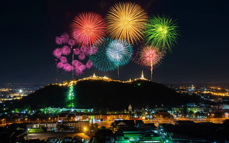 Colorful fireworks lighting up the night sky during New Year celebrations in Thailand